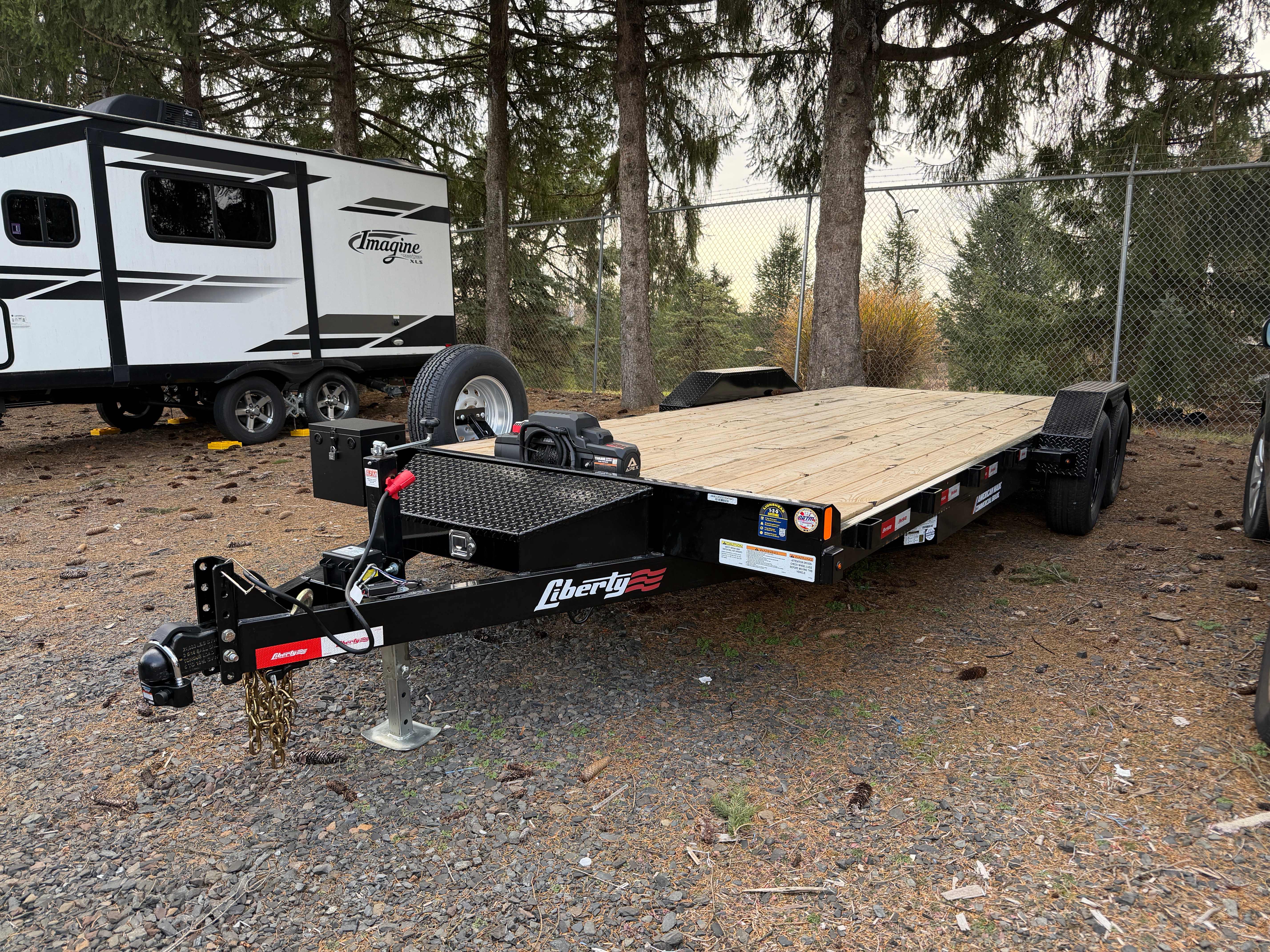 Professional 20ft car hauler flatbed trailer with Liberty winch system available for rent in Warminster PA